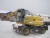 Колесный экскаватор New Holland MH 4.6 купить в компании Рабочие Машины