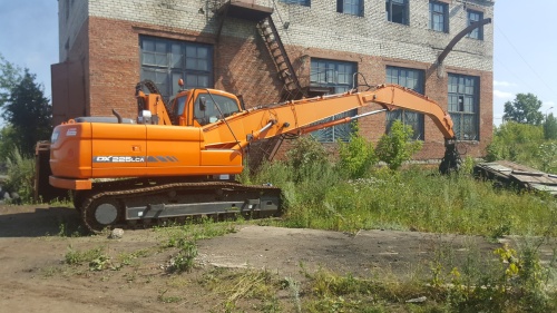 Гусеничный экскаватор (перегружатель) DOOSAN DX 225 LCA купить в компании Рабочие Машины