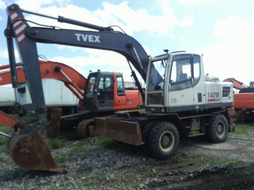 Колесный экскаватор ТВЭКС 140W 2013 г купить в компании Рабочие Машины
