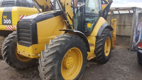 Экскаватор - погрузчик CATERPILLAR 444E 2012 гв купить в компании Рабочие Машины
