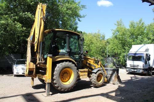 Экскаватор - погрузчик KOMATSU WB93R купить в компании Рабочие Машины