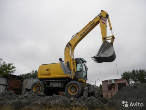 Колесный экскаватор NEW HOLLAND MH Plus купить в компании Рабочие Машины