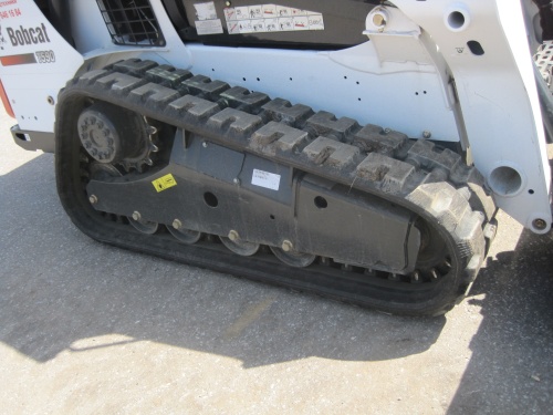 Мини - погрузчик гусеничный BOBCAT T590 2014 года купить в компании Рабочие Машины