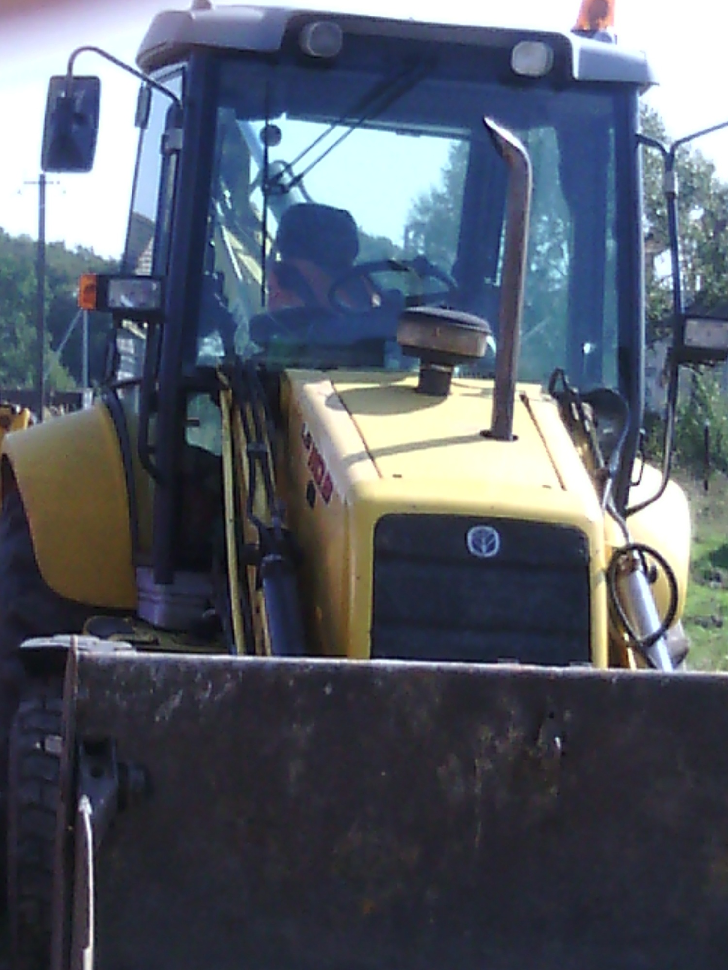 Экскаватор - погрузчик NEW HOLLAND LB 110.B купить в компании Рабочие Машины