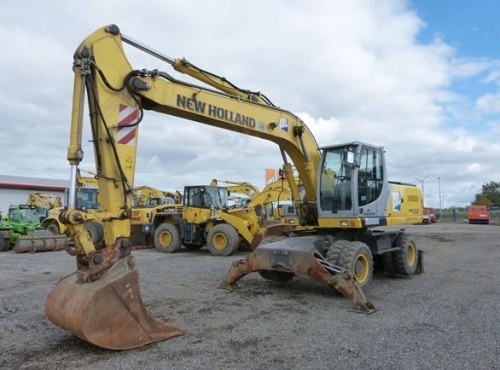 Колёсный экскаватор New Holland MH 6.6 купить в компании Рабочие Машины