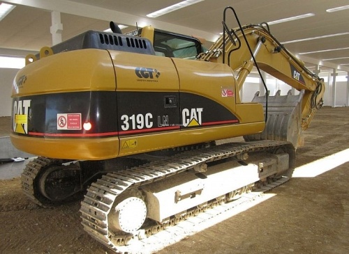 Экскаватор гусеничный Cat 319DNL купить в компании Рабочие Машины
