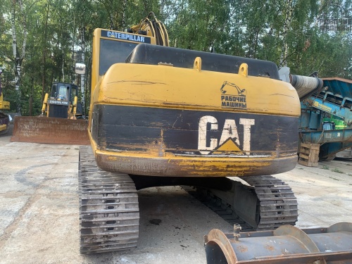 Гусеничный экскаватор CAT 318 купить в компании Рабочие Машины
