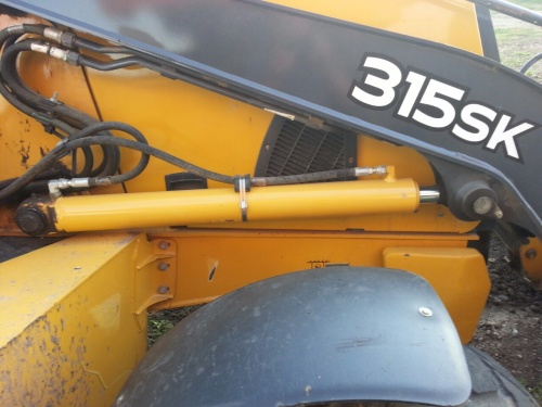 Экскаватор - погрузчик JOHN DEERE 315SK купить в компании Рабочие Машины