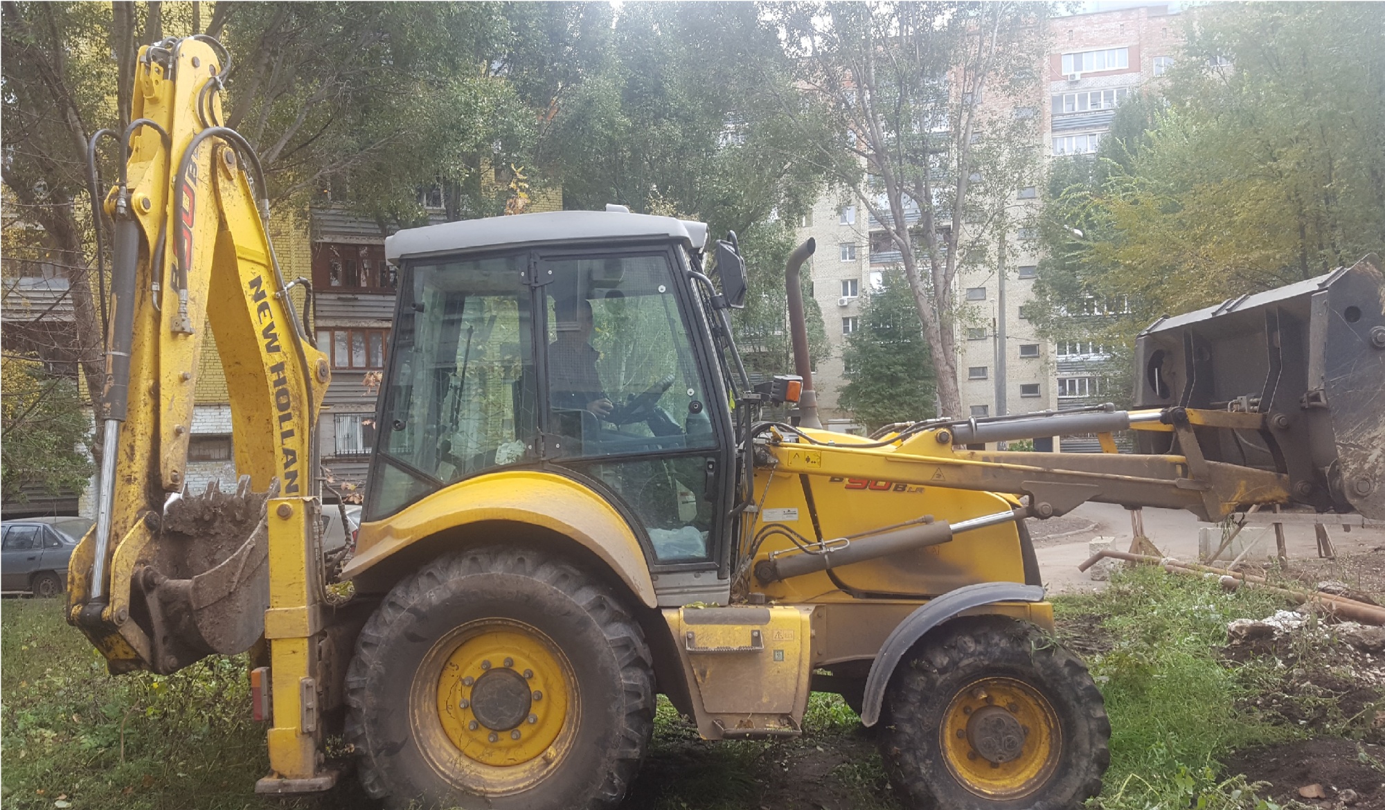 Экскаватор - погрузчик NEW HOLLAND B90B купить в компании Рабочие Машины