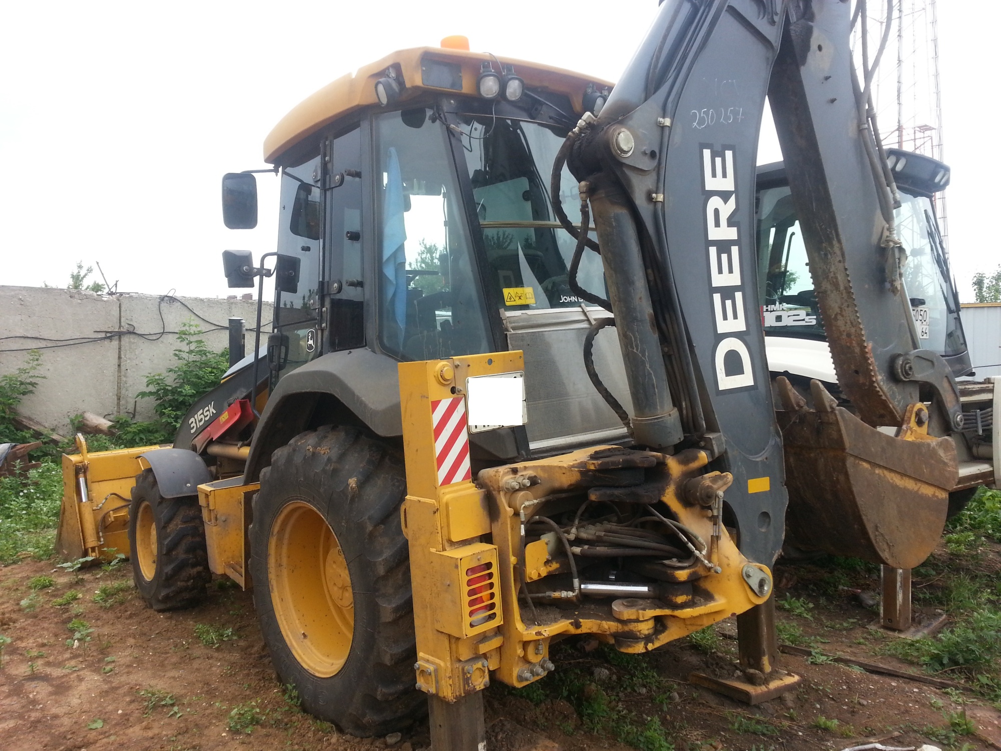 Экскаватор - погрузчик JOHN DEERE 315SK купить в компании Рабочие Машины