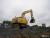Колесный экскаватор NEW HOLLAND MH Plus купить в компании Рабочие Машины