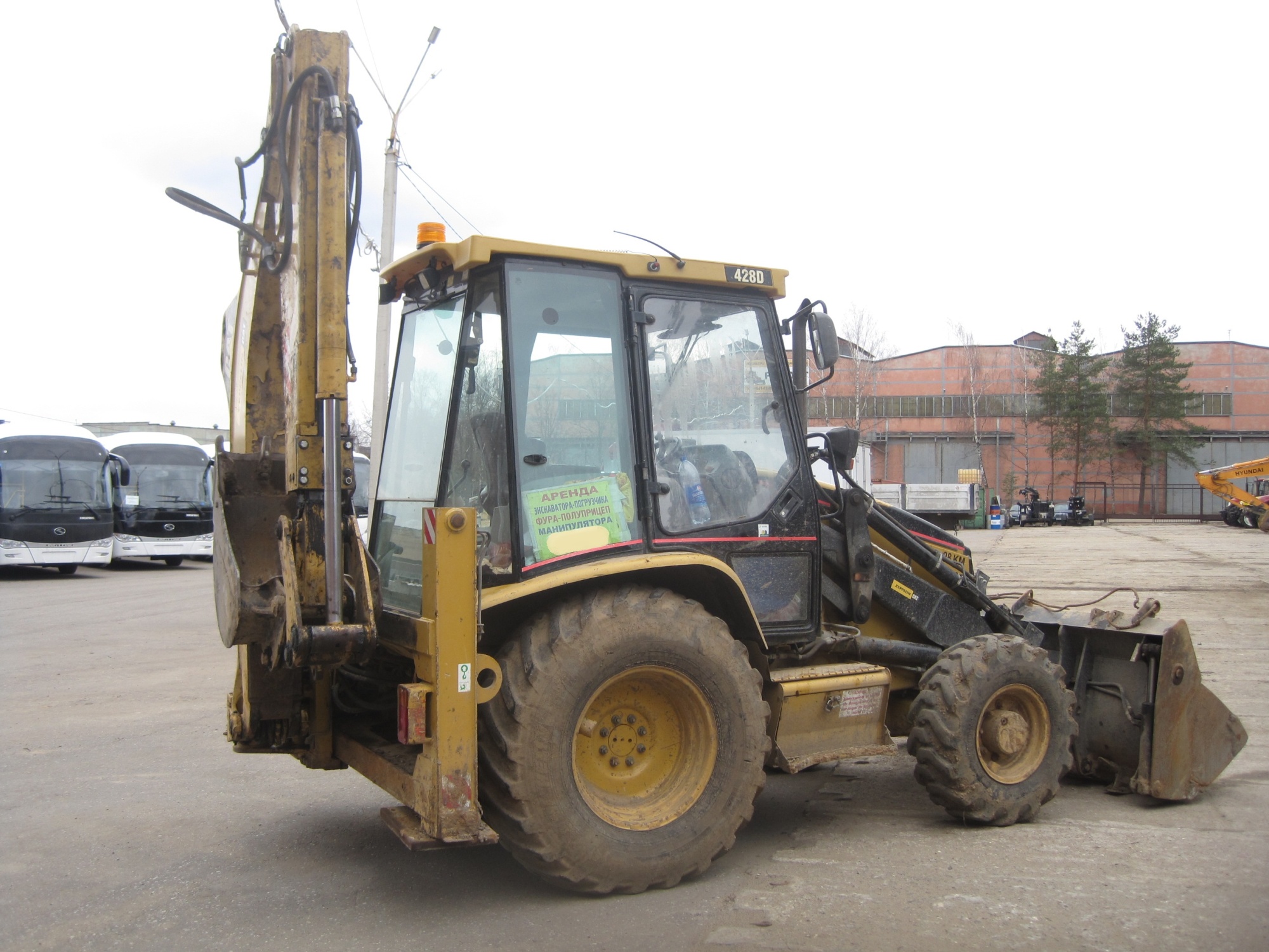 экскаватор-погрузчик CAT 428D купить в компании Рабочие Машины