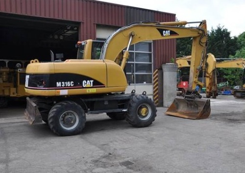 Колесный экскаватор Caterpillar M316C купить в компании Рабочие Машины