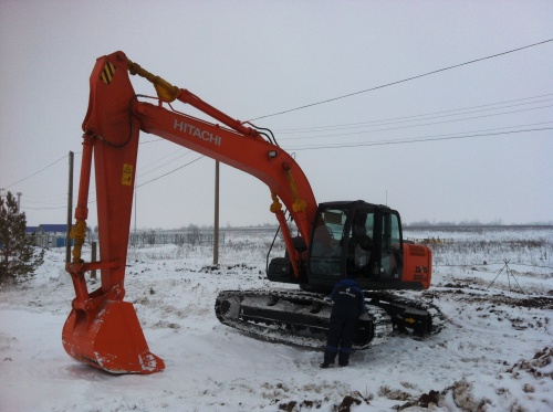 экскаватор гусеничный Hitachi ZX 200 купить в компании Рабочие Машины