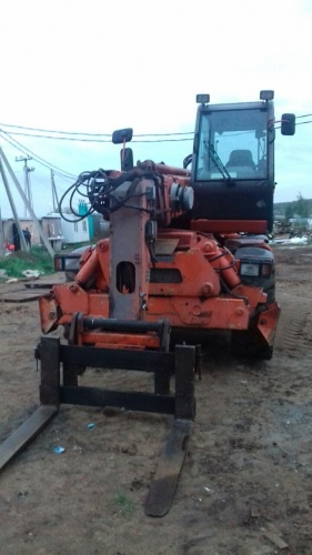 Телескопический погрузчик MANITOU MRT 18.40 1999 года купить в компании Рабочие Машины