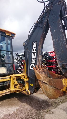Экскаватор - погрузчик JOHN DEERE 325К купить в компании Рабочие Машины