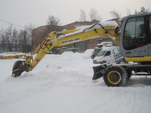 Колесный экскаватор New Holland MH 4.6 купить в компании Рабочие Машины