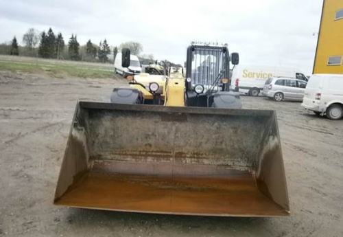 Телескопический погрузчик Caterpillar TH407 купить в компании Рабочие Машины