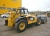 Телескопический погрузчик Caterpillar TH407 купить в компании Рабочие Машины