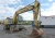 Колёсный экскаватор New Holland MH 6.6 купить в компании Рабочие Машины
