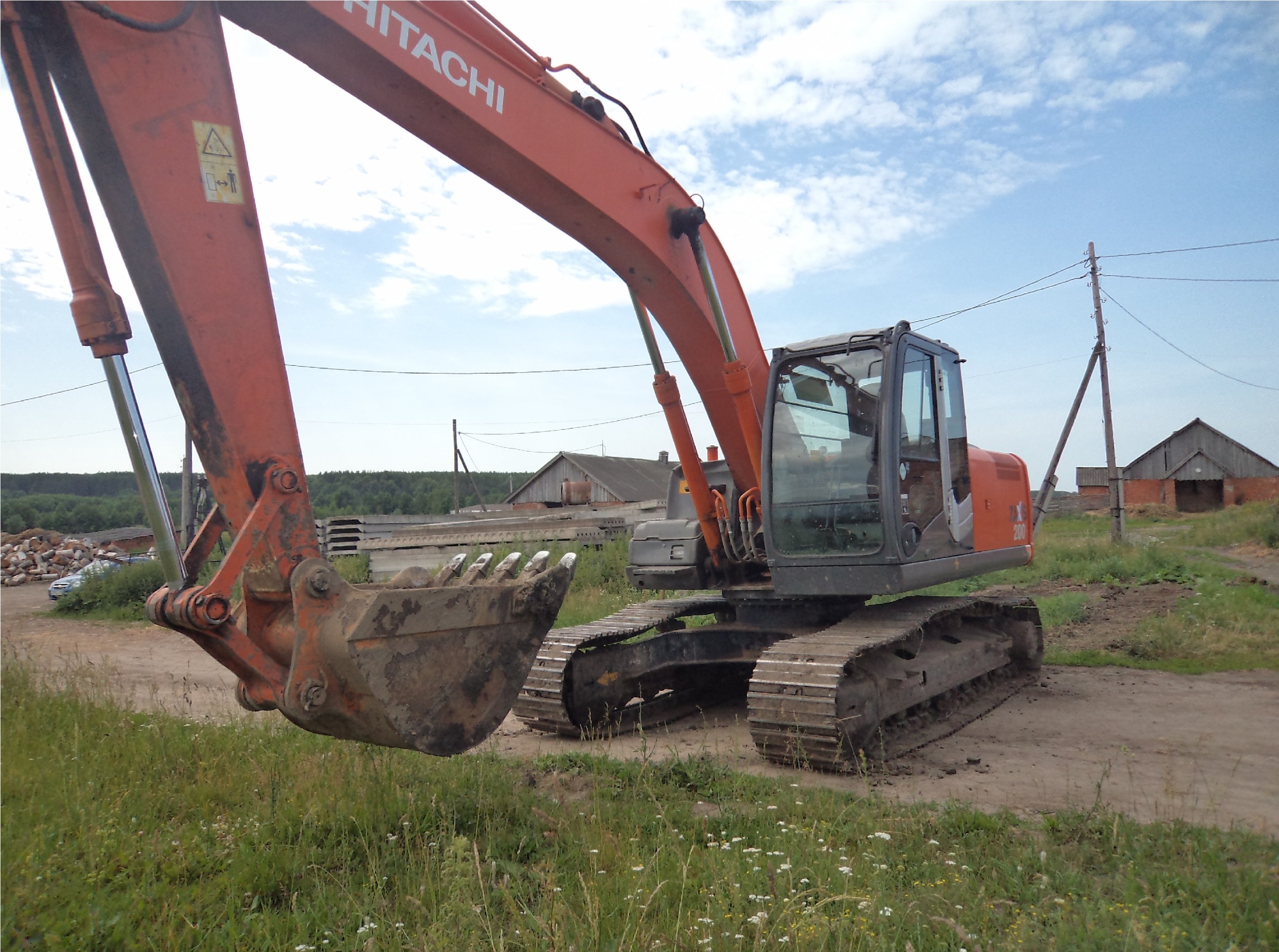 Гусеничный экскаватор HITACHI ZX 200LC купить в компании Рабочие Машины