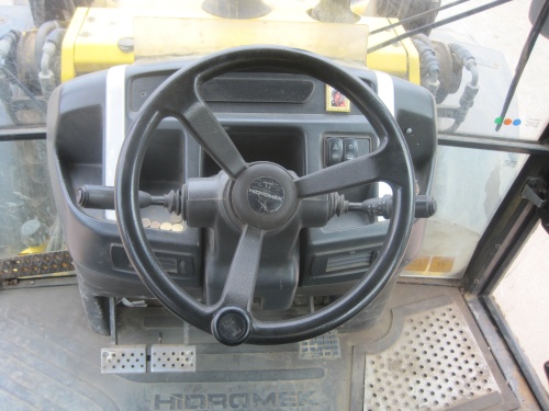 Экскаватор - погрузчик HIDROMEK HMK 102S 2010 г купить в компании Рабочие Машины