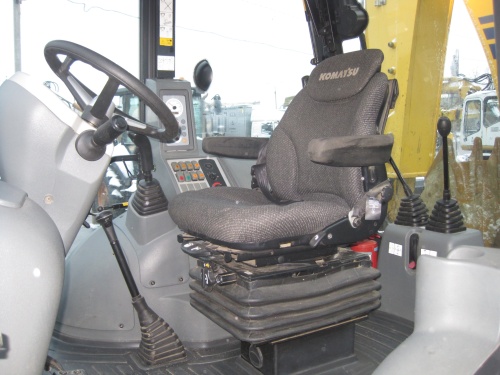 Экскаватор - погрузчикKOMATSUWB93R-5 купить в компании Рабочие Машины