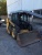 Мини-погрузчик фронтальный NEW HOLLAND L215 купить в компании Рабочие Машины