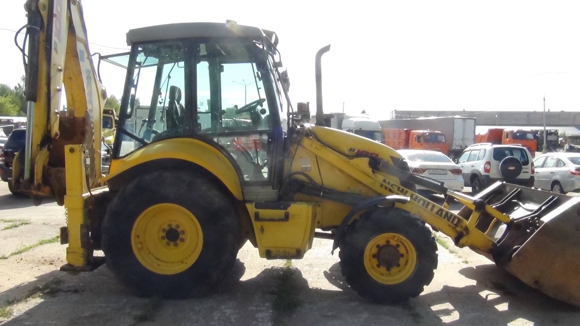 Экскаватор-погрузчик NEW HOLLAND B100B купить в компании Рабочие Машины