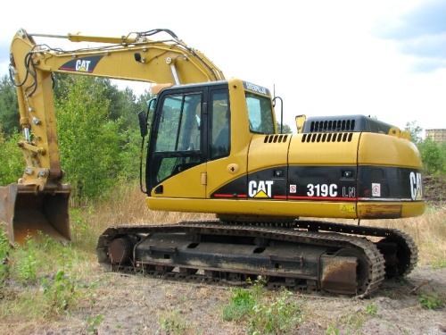 Экскаватор гусеничный Caterpillar 319C купить в компании Рабочие Машины